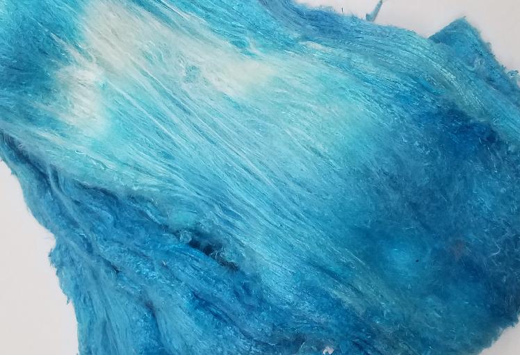 Bewitching Fibers Hand-Painted Mulberry Silk Lap per Ounce - Aqua Bewitching Fibers Hand-Painted Mulberry Silk Lap per Ounce - Aqua